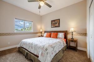 a bedroom with a bed and a window at Heated Pool and Spa, Sleeps 6 - Villa Cayman in North Fort Myers +46 photos
