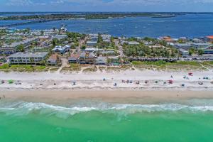 an aerial view of the beach at a resort at Playa Esmeralda One Bedroom Cottages in Bradenton Beach