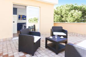 A seating area at Residence Del Sole