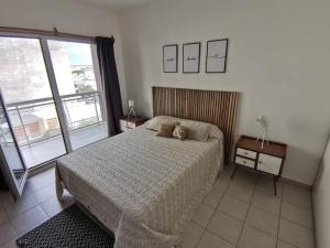 En eller flere senge i et værelse på Whales&beach II