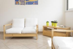 A bed or beds in a room at Residence Del Sole