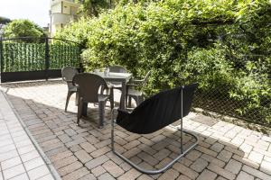 A garden outside Residence Del Sole