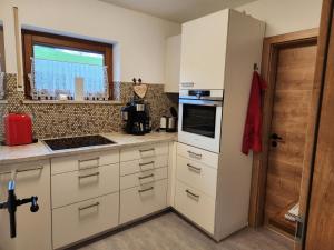 Dapur atau dapur kecil di Moderne Ferienwohnung im Südschwarzwald