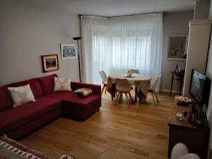 A seating area at Appartamento Isa
