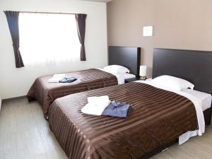 Ocean's Resort Villa Vorla - Vacation STAY 36094v房間的床
