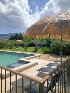 The swimming pool at or close to Le Faré Tchanqué Chambre d’hôtes Référence