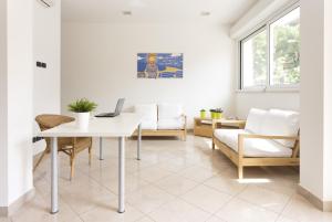 A seating area at Residence Del Sole
