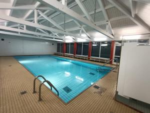 a large swimming pool in a large building at Sonnenkalb in Todtmoos