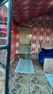 Tempat tidur dalam kamar di Omar Ghazi Camp
