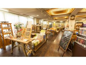 a book store with tables and shelves of books at Wano Resort Hazu - Vacation STAY 25560v in Gamagōri