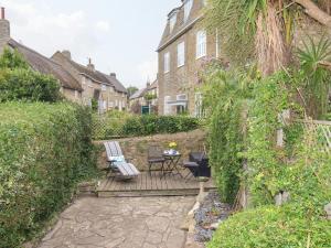 En have udenfor Dormouse Cottage