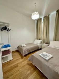 A bed or beds in a room at Due Passi dal Porto