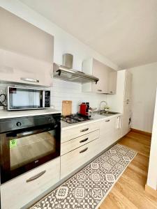 A kitchen or kitchenette at Due Passi dal Porto