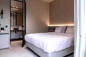 Voodi või voodid majutusasutuse Hotel T toas