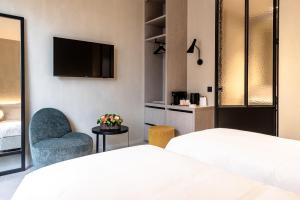 Voodi või voodid majutusasutuse Hotel T toas