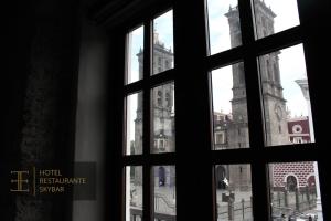 El Encanto في بوبلا: نافذة مفتوحة مطلة على المدينة