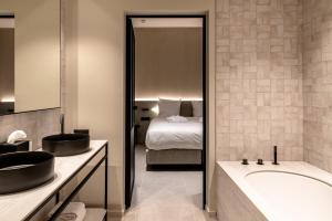 Voodi või voodid majutusasutuse Hotel T toas