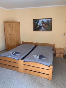 Katil atau katil-katil dalam bilik di Penzion Sport