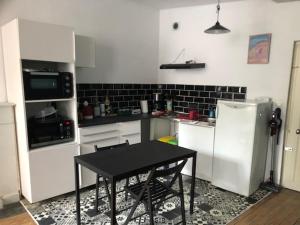 Köök või kööginurk majutusasutuses L'appart' du fil