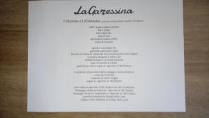 a white piece of paper with a list of names at LaGaressina suite Anna - Jacuzzi & Spa in Garessio