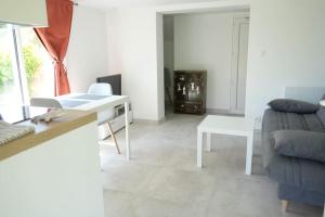 Ruang duduk di T2 calme aux portes de Brest +3 gambar