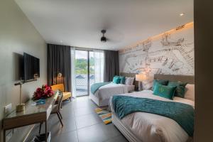 Letto o letti in una camera di Fort Young Hotel