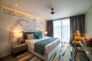 Letto o letti in una camera di Fort Young Hotel
