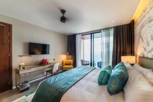 Letto o letti in una camera di Fort Young Hotel