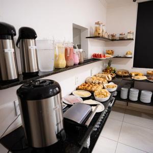 Kitchen o kitchenette sa Pousada Villa Costeira