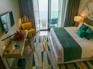 Letto o letti in una camera di Fort Young Hotel