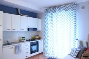 A kitchen or kitchenette at Residence Del Sole