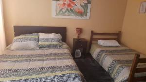 Cama ou camas em um quarto em Hostal del Prado