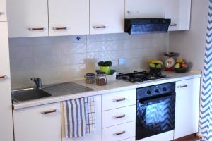 A kitchen or kitchenette at Residence Del Sole