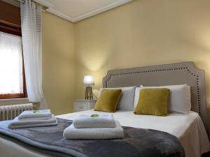 Cama o camas de una habitación en Casa de Huéspedes Vecinodecerbantes