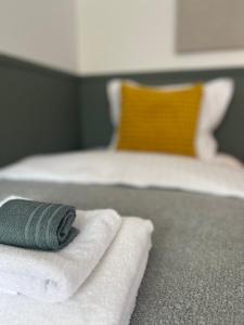 Postel nebo postele na pokoji v ubytování Flóki by Guesthouse Reykjavík