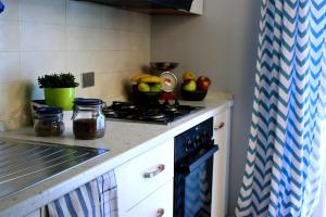 A kitchen or kitchenette at Residence Del Sole