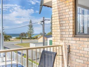 a balcony with a view of the ocean at Kingscliff Beachfront Abode - Hosted by Holiday Management in Kingscliff