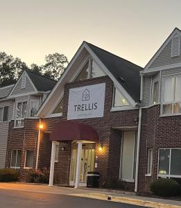 a building with a sign that reads tralls at Trellis Durham RTP in Durham