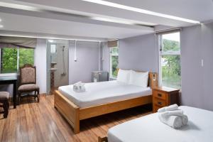 Krevet ili kreveti u jedinici u objektu Lilac Cottage Homestay