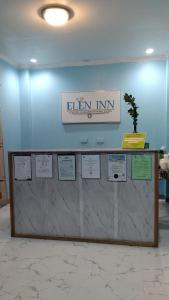 マラパスクア島にあるELEN INN - Malapascua Island Air-conditioned Room2の室内の看板