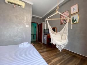 Postel nebo postele na pokoji v ubytování Dylan Hotel