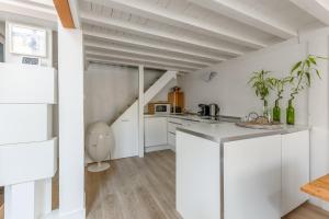 Virtuvė arba virtuvėlė apgyvendinimo įstaigoje Appartement Boichot - Welkeys