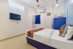 Postel nebo postele na pokoji v ubytování Via Solitaire, Surat + 22 fotografií