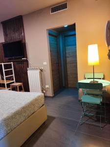 Posteľ alebo postele v izbe v ubytovaní Dannunziano Aparthotel