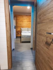 Posteľ alebo postele v izbe v ubytovaní Dannunziano Aparthotel