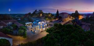 an aerial view of a town at night at Centro Storico in Neviglie