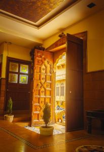 an open door to a room with a wine cellar at The Elite Castle in Jaisalmer
