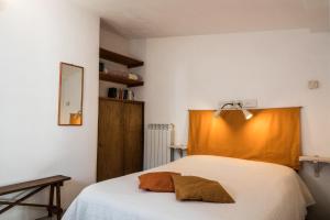 Postel nebo postele na pokoji v ubytování B&b Cinque Stalle