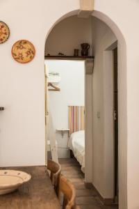 Postel nebo postele na pokoji v ubytování B&b Cinque Stalle