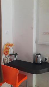 Příslušenství pro přípravu čaje a kávy v ubytování The Agung Residence